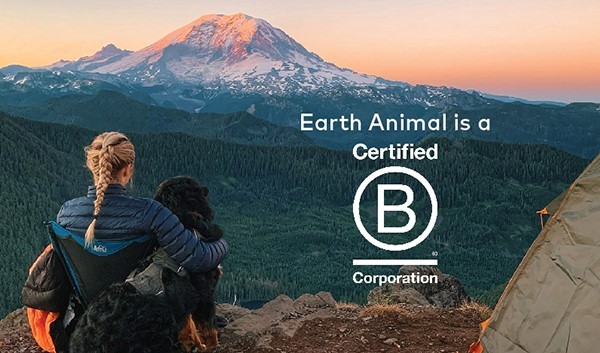 girl with French braid and dog camping with a mountain sunset view and text saying Earth Animal is a certified B corporation Tracie Hotchner the Radio Pet Lady 